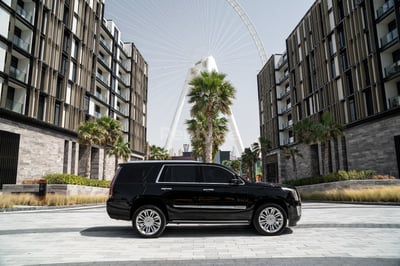 Schwarz Cadillac Escalade Platinum zur Miete in Abu-Dhabi 0