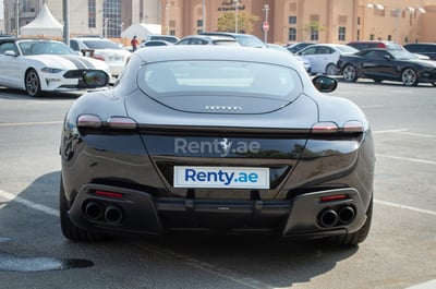 Black Ferrari Roma for rent in Dubai 1