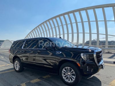 Black GMC Yukon XL for rent in Sharjah 1