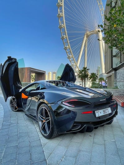 Black McLaren 570S Spyder for rent in Dubai 0