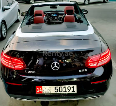 Black Mercedes C200 cabrio for rent in Sharjah 0