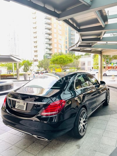 Black Mercedes C Class for rent in Sharjah 1