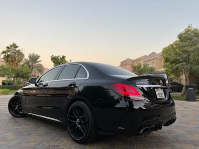 Black Mercedes C300 with C63 Black Edition Bodykit for rent in Dubai 1