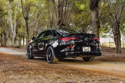 Black Mercedes CLA 250 with CLA 45 Body Kit for rent in Dubai 0