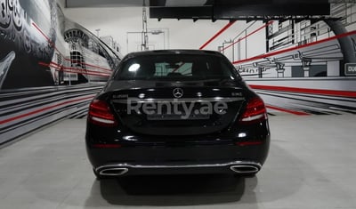 Black Mercedes E 200 for rent in Dubai 1