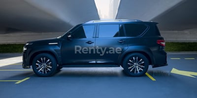 Black Nissan Patrol Blackhowk for rent in Dubai 0