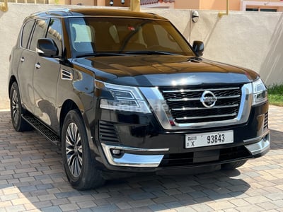 Black Nissan Patrol V8 four wheel drive for rent in Abu-Dhabi 1