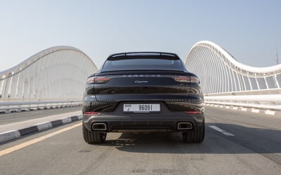 Black Porsche Cayenne coupe for rent in Abu-Dhabi 0