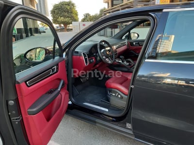 Black Porsche Cayenne S for rent in Sharjah 1