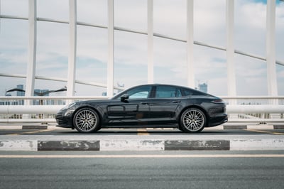 Black Porsche Panamera for rent in Dubai 0