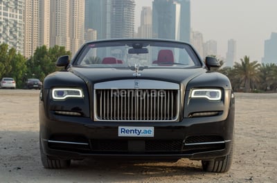 أسود Rolls Royce Dawn للإيجار في أبو ظبي 0