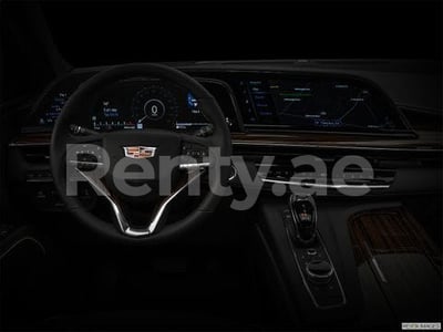 أزرق Cadillac Escalade للإيجار في أبو ظبي 0