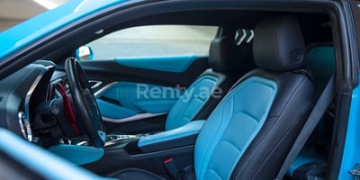 Blue Chevrolet Camaro evo dynamic for rent in Dubai 1