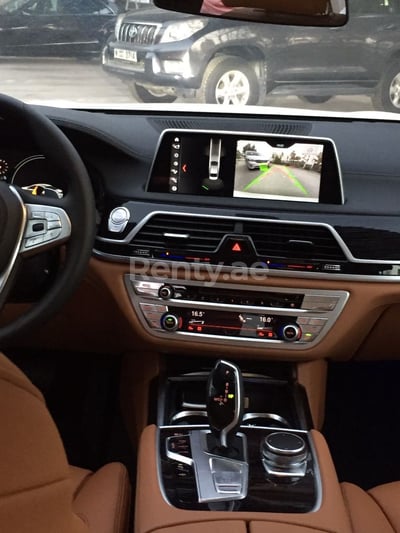 Bright White BMW 7 Series for rent in Dubai 1