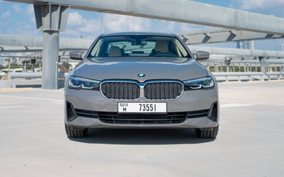 Grey BMW 520i for rent in Sharjah 0