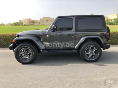 Grey Jeep Wrangler for rent in Sharjah 1