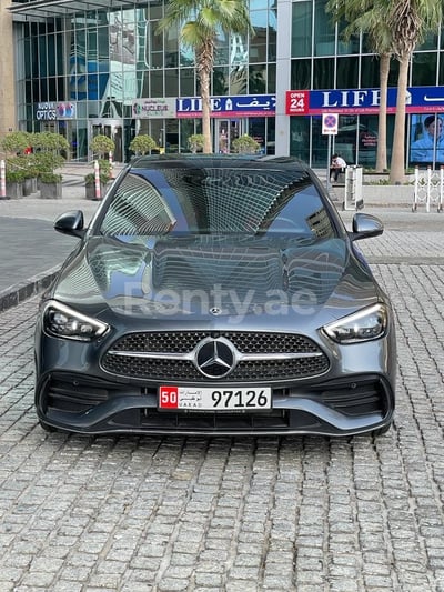 Grey Mercedes C200 for rent in Sharjah 0