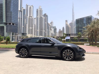 Grey Porsche Taycan for rent in Abu-Dhabi 0