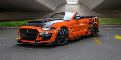 Orange Ford Mustang for rent in Dubai 0