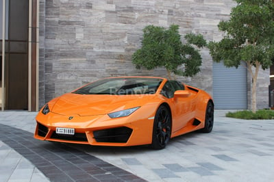 Orange Lamborghini Huracan Spider for rent in Dubai 1