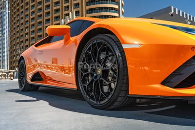 Orange Lamborghini Huracan for rent in Dubai 1