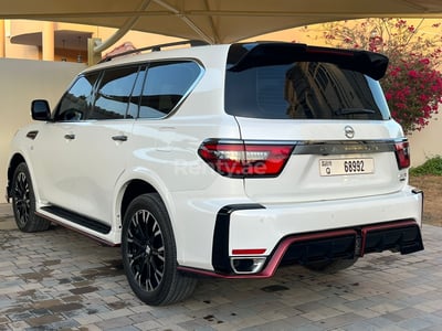 Pearl White Nissan Patrol for rent in Abu-Dhabi 0