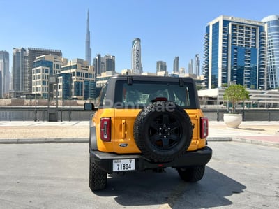 Yellow Ford Bronco Wildtrak 2021 for rent in Dubai 1