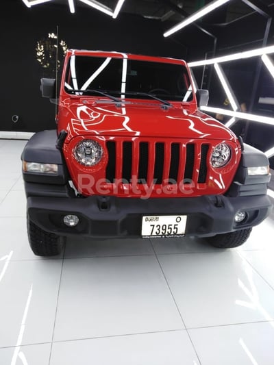 Rouge Jeep Wrangler en location à Dubai 1