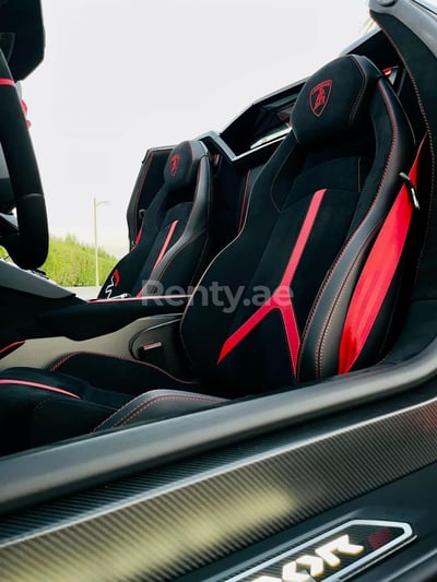 Red Lamborghini Aventador SVJ Spyder for rent in Sharjah 0