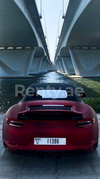 Red Porsche 911 Carrera GTS cabrio for rent in Dubai 1