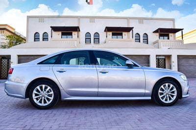 Silver Audi A6 for rent in Sharjah 0