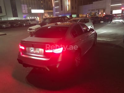 Silver BMW 320 for rent in Dubai 1