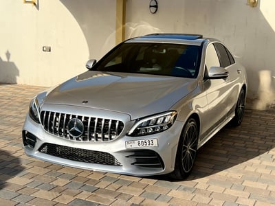 Silver Mercedes C Class C43 AMG KIT for rent in Dubai 0