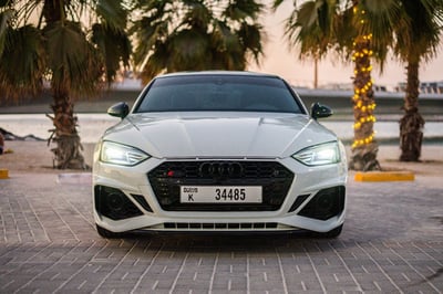 White 2021 Audi A5 with RS5 Bodykit for rent in Dubai 0