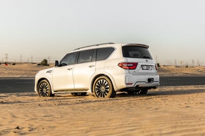 White 2021 Nissan Patrol Platinum for rent in Sharjah 1