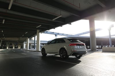 White Audi Q8  55TFSI quattro for rent in Abu-Dhabi 1