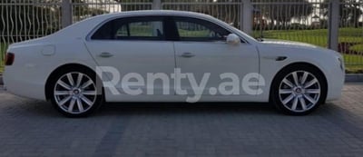 White Bentley Flying Spur for rent in Dubai 0