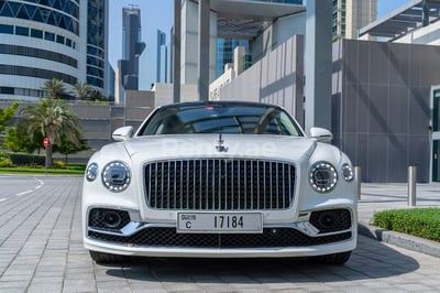 White Bentley Flying Spur for rent in Sharjah 0