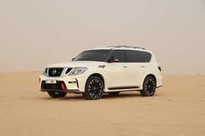 White Nissan Patrol V8 with Nismo Bodykit for rent in Sharjah 0