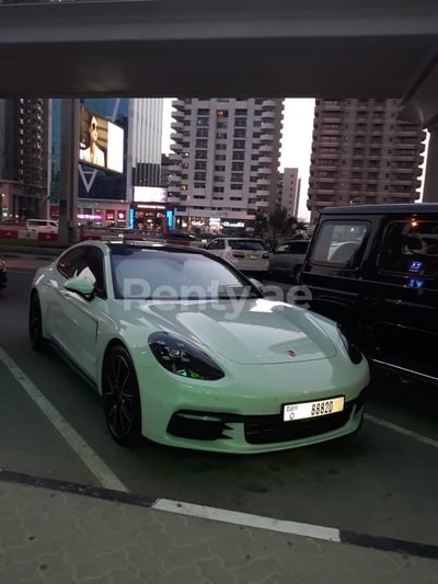 White Porsche Panamera for rent in Dubai 0