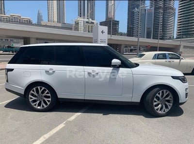 White Range Rover Vogue Supercharged for rent in Dubai 1