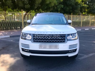 White Range Rover Vogue for rent in Dubai 0