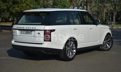 White Range Rover Vogue for rent in Abu-Dhabi 0