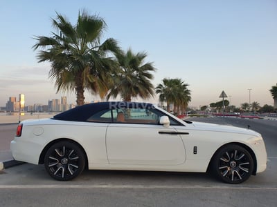 White Rolls Royce Dawn Black Badge for rent in Sharjah 0