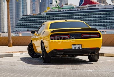 Yellow Dodge Challenger for rent in Dubai 0