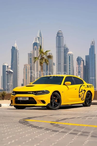 Yellow Dodge Charger R/T for rent in Abu-Dhabi 1