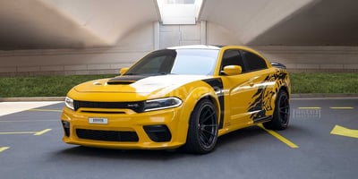 Yellow Dodge Charger for rent in Abu-Dhabi 0