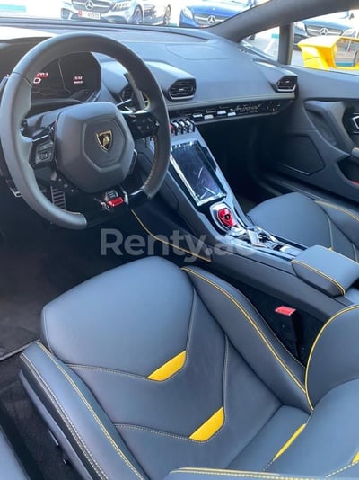 Yellow Lamborghini Evo for rent in Dubai 0