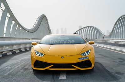 Yellow Lamborghini Huracan Coupe for rent in Dubai 0