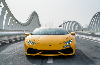 Yellow Lamborghini Huracan Coupe for rent in Dubai 0